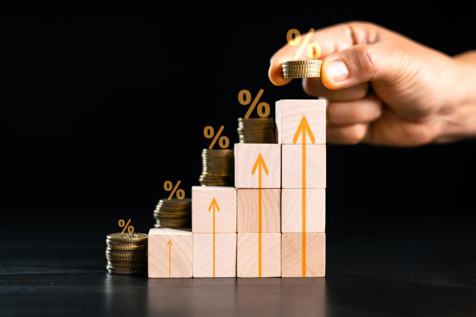 Stacked coins suggesting gradual compound growth