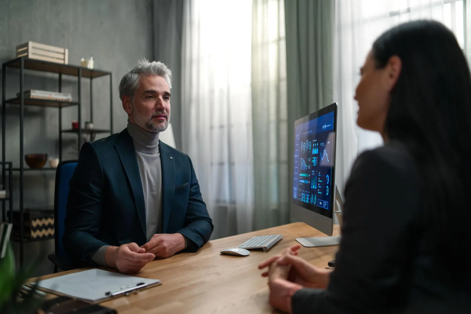 Professional handshake at an advisory meeting